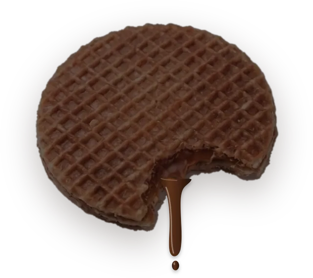 A chocolate stroopwafel with a bite taken out and chocolate dripping